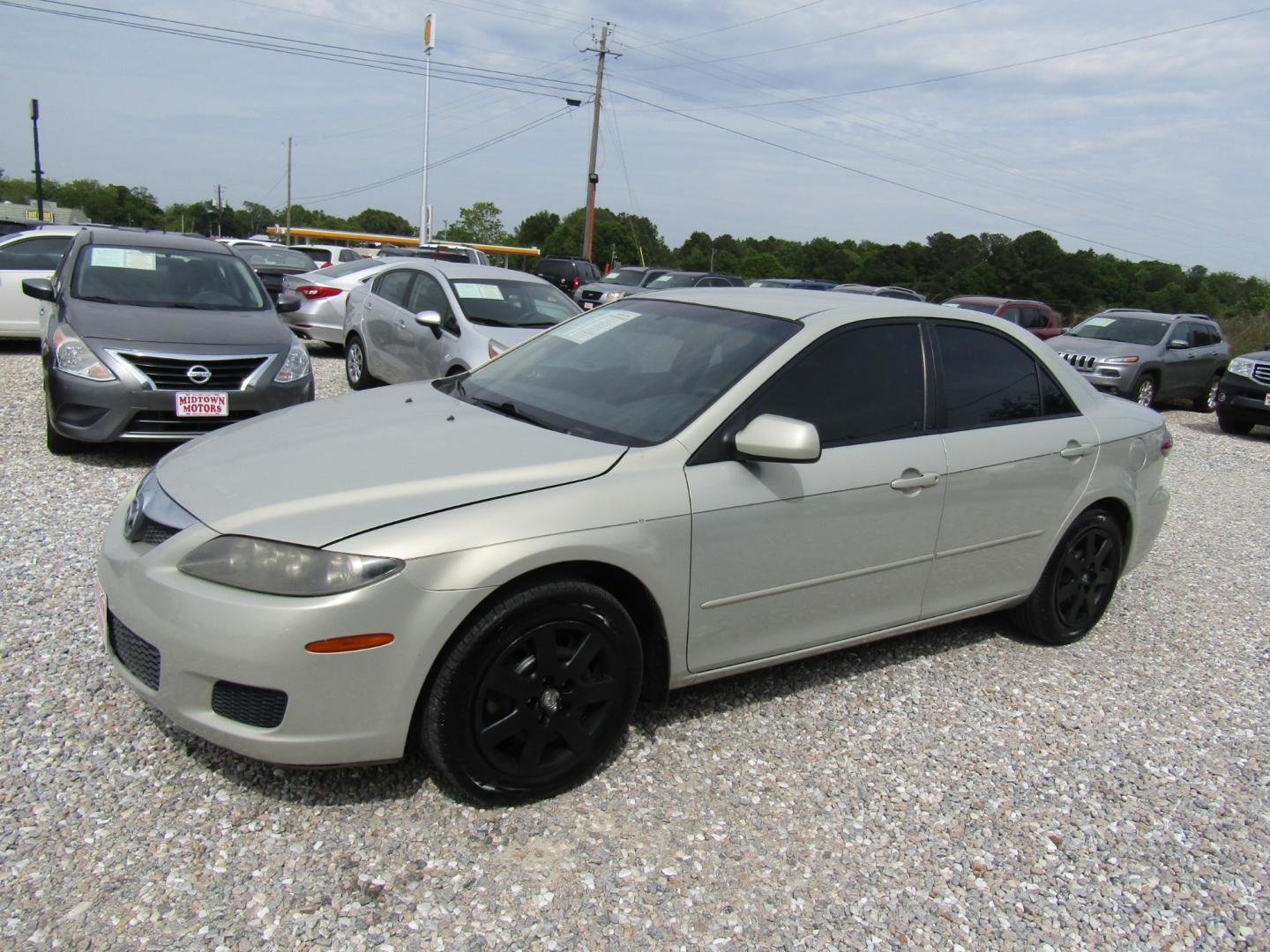 2006 Gold /Tan Mazda MAZDA6 i Sports Sedan (1YVFP80C465) with an 2.3L L4 DOHC 16V engine, Automatic transmission, located at 15016 S Hwy 231, Midland City, AL, 36350, (334) 983-3001, 31.306210, -85.495277 - Photo#2